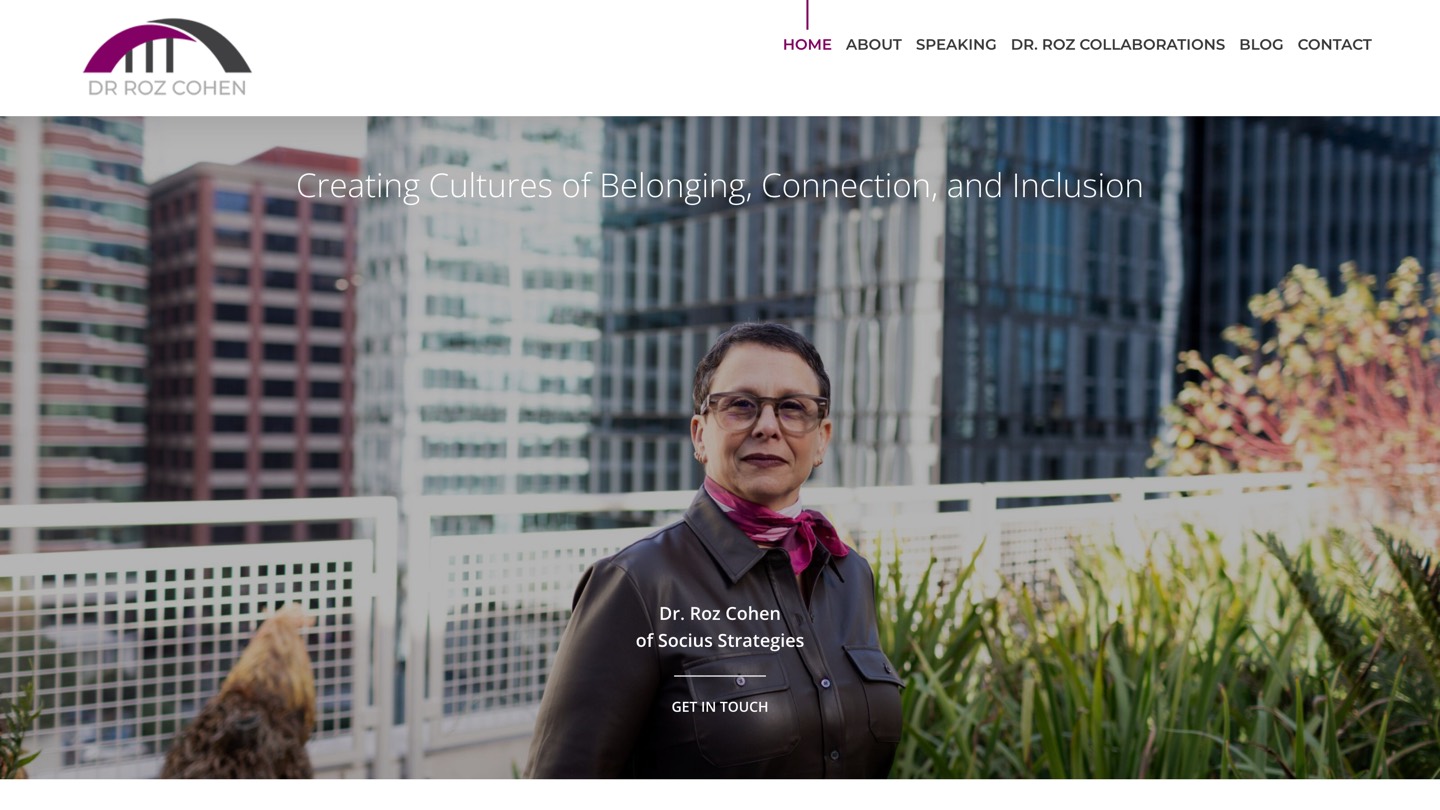 The drrozcohen.com home page: Dr. Roz Cohen on a city rooftop under the line Creating Cultures of Belonging, Connection, and Inclusion.